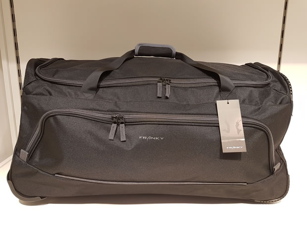 OecherDeal prsentiert Mode in Leder Vorpeil mit einer Rollentasche
